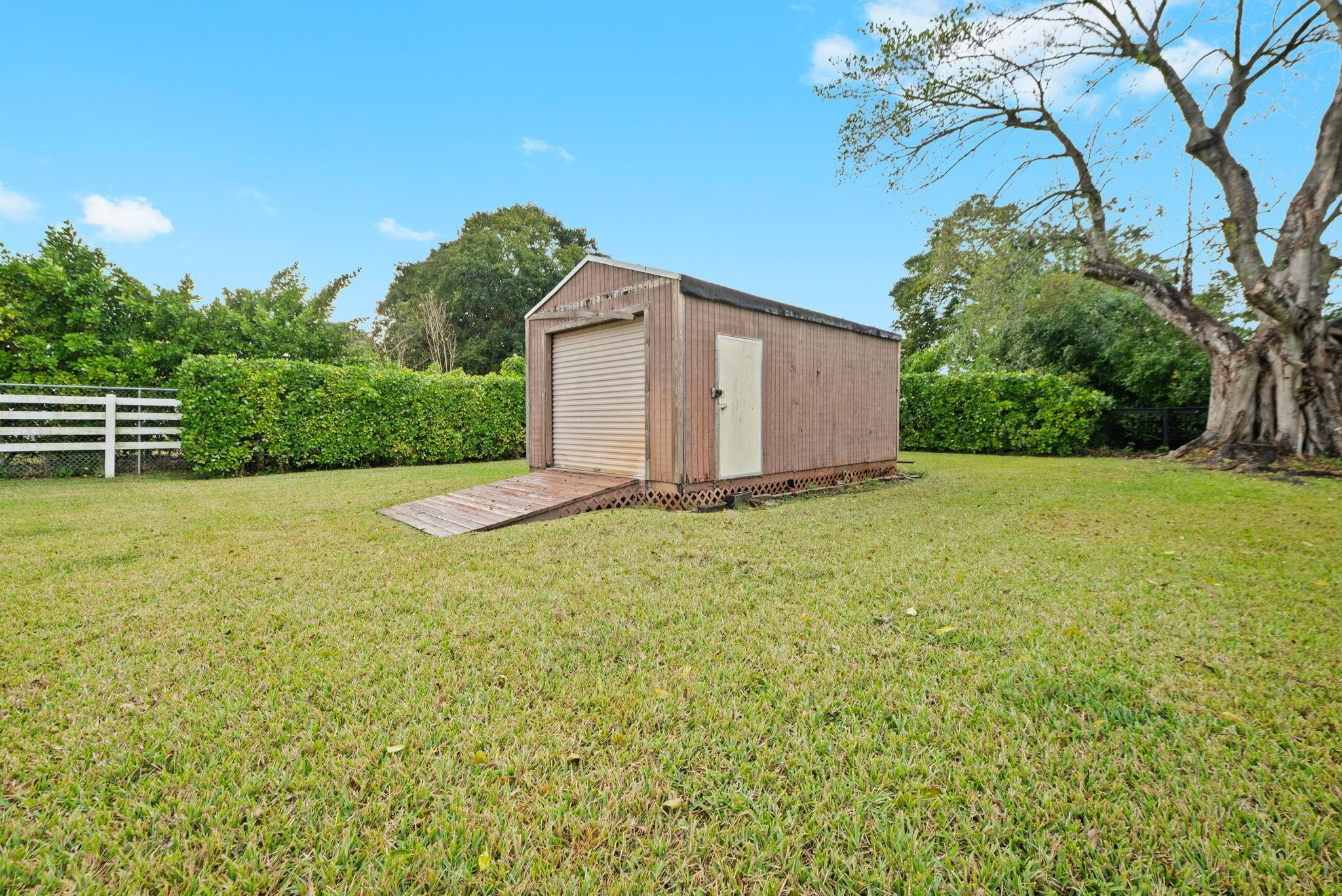 17501 Southwest 54th Street Southwest Ranches, FL 33331 - Photo 38 of 39 a view of a house with a yard
