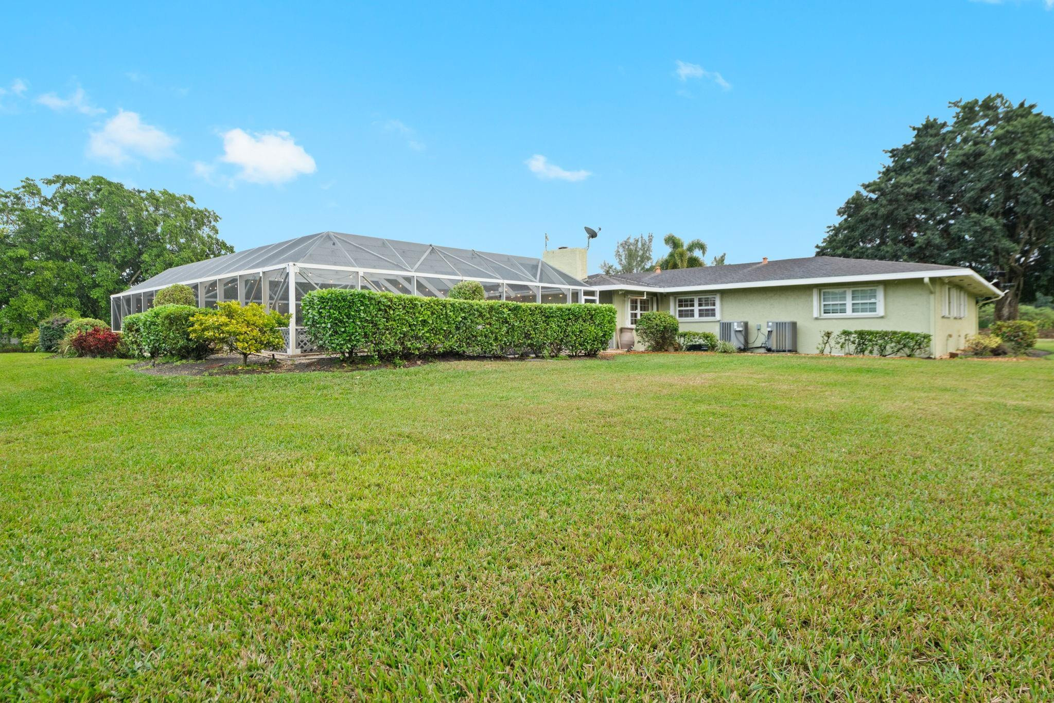 17501 Southwest 54th Street Southwest Ranches, FL 33331 - Photo 39 of 39 a view of a house with a yard and sitting space