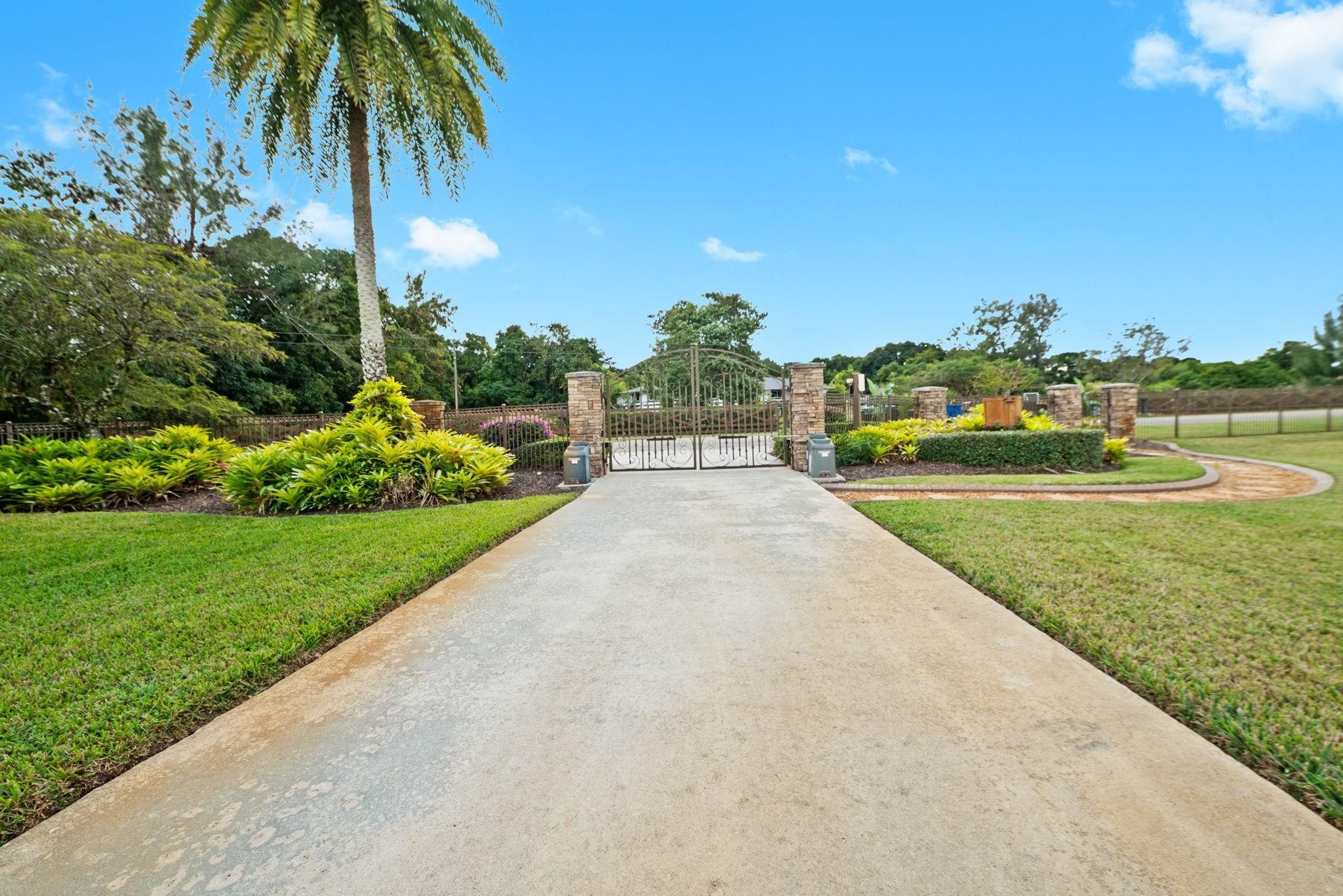 17501 Southwest 54th Street Southwest Ranches, FL 33331 - Photo 5 of 39 a view of a swimming pool and a yard