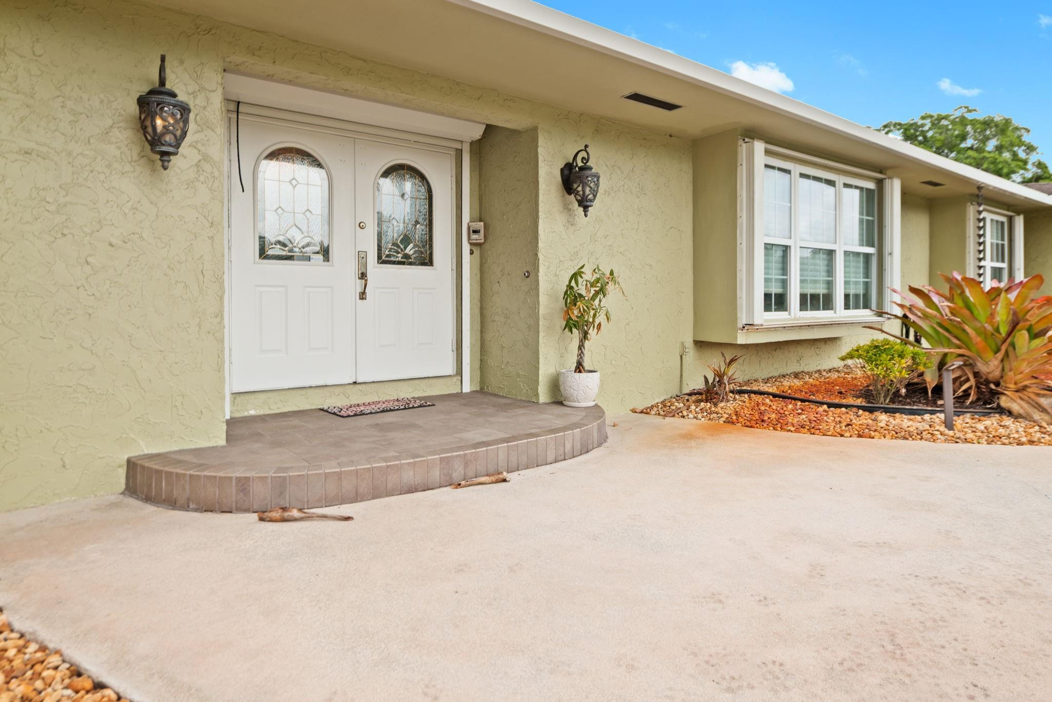 17501 Southwest 54th Street Southwest Ranches, FL 33331 - Photo 8 of 39 a view of a bedroom with wooden floor and windows