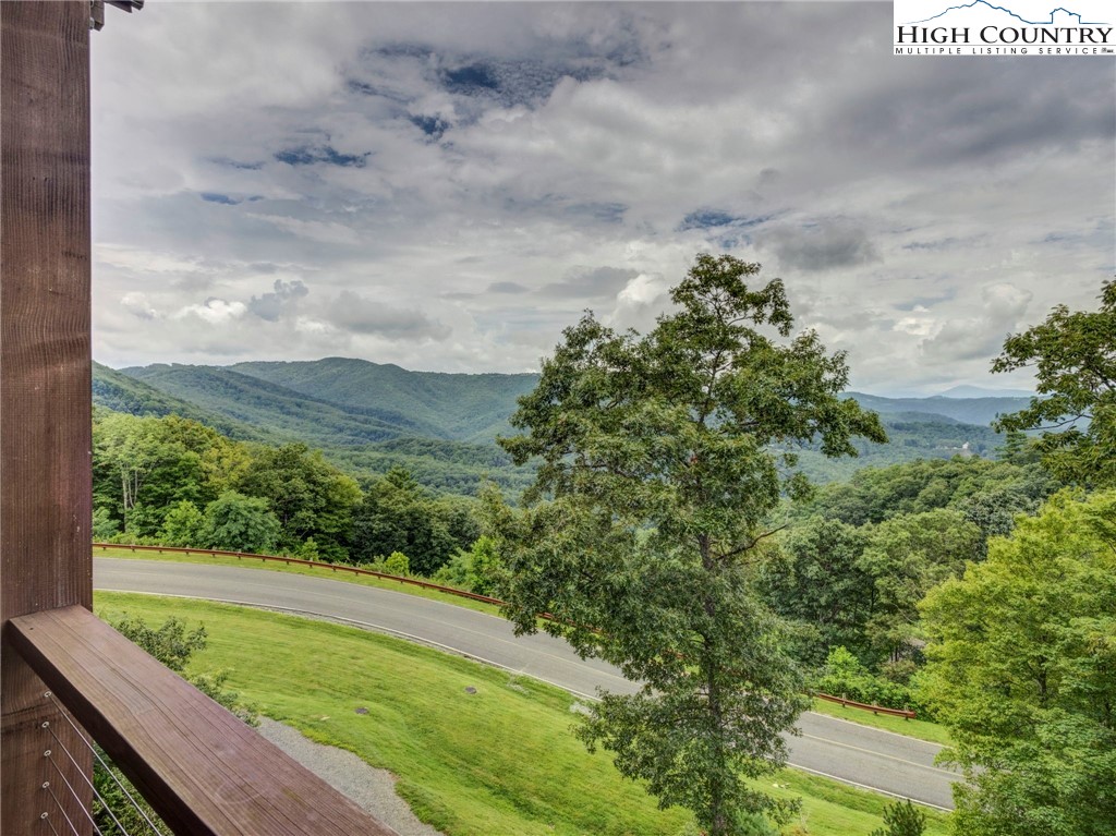 198 Ramblestone Terrace, Unit 203 Boone, NC 28607 - Photo 2 of 39 a view of a yard with an outdoor seating