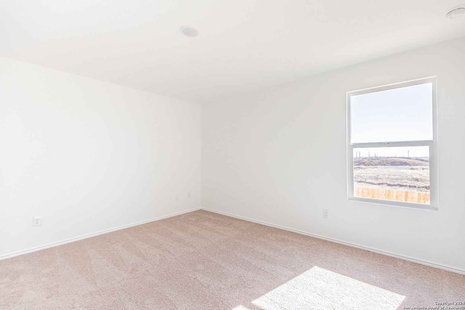 1631 Knoll Ridge New Braunfels, TX 78130 - Photo 14 of 29 an empty room with a window