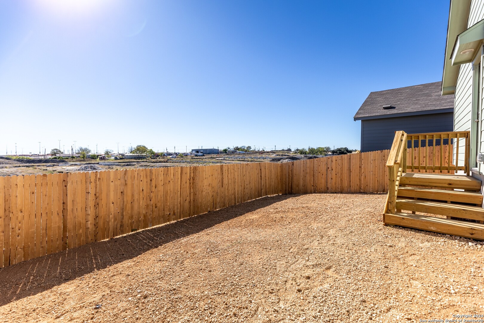 1631 Knoll Ridge New Braunfels, TX 78130 - Photo 25 of 29 a view of a lake with wooden fence