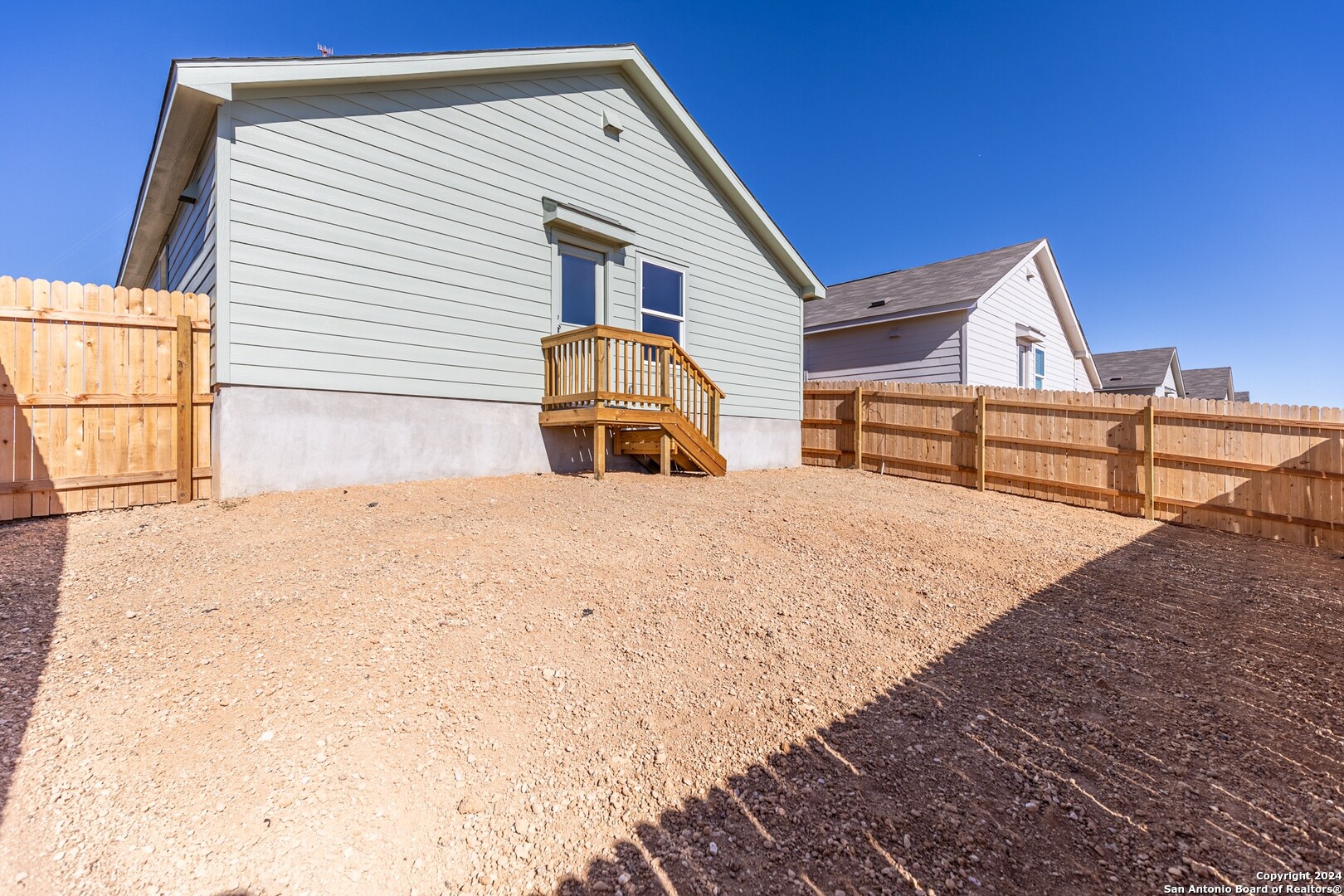 1631 Knoll Ridge New Braunfels, TX 78130 - Photo 27 of 29 a front view of a house with a yard