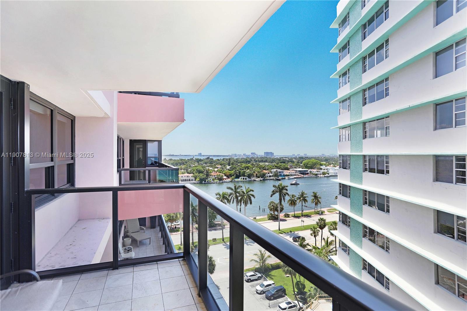 5225 Collins Avenue, Unit 1216 Miami Beach, FL 33140 - Photo 33 of 49 a balcony with an outdoor seating