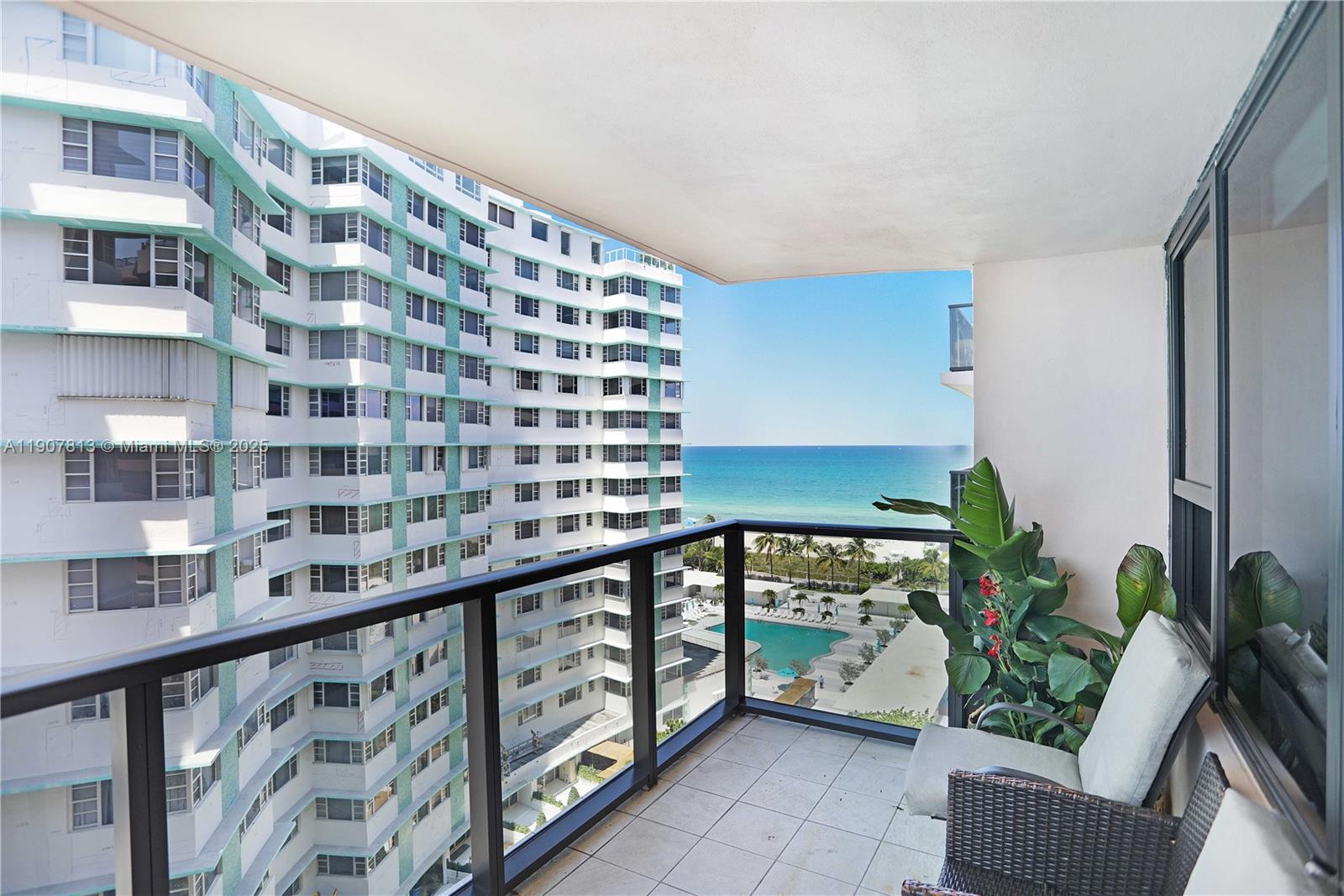 5225 Collins Avenue, Unit 1216 Miami Beach, FL 33140 - Photo 4 of 49 a view of a balcony with furniture