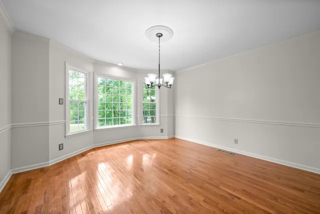 a bathroom with a double vanity sink mirror and shower