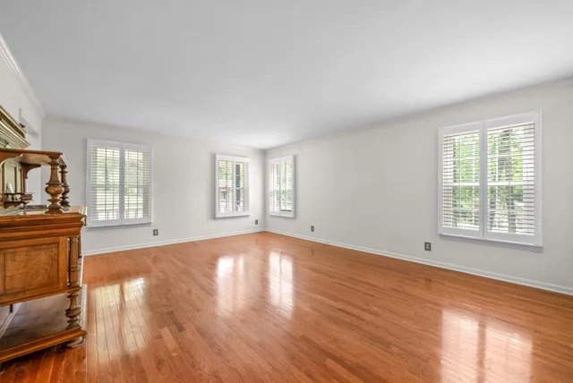 a kitchen with stainless steel appliances sink refrigerator and microwave