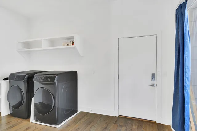 a utility room with dryer and washer