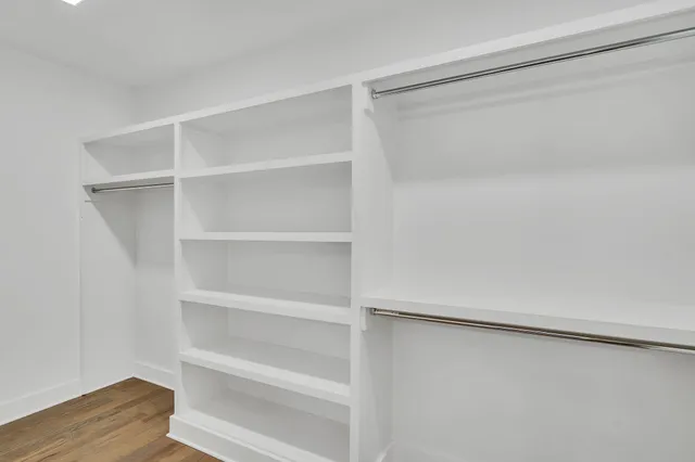 a view of an empty walk in closet