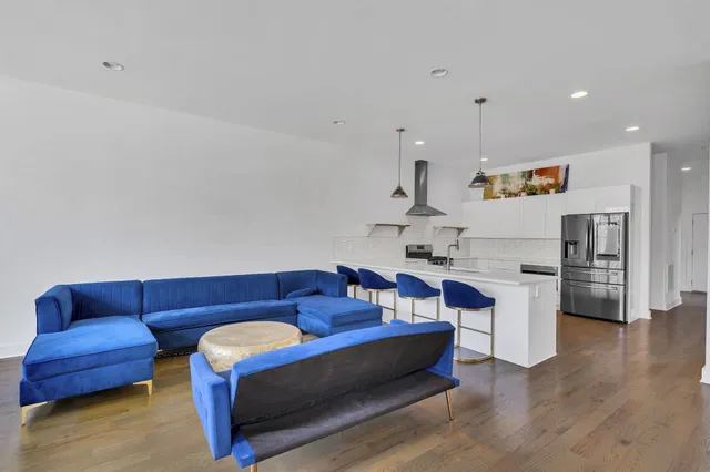 a living room with furniture and a couch