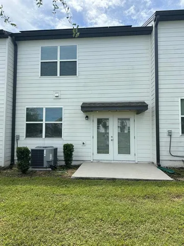 a view of a park with large trees