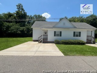 3916 Middle Street Hope Mills, NC 28348 - Photo 2 of 12 a view of backyard of the house