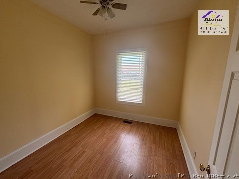 3916 Middle Street Hope Mills, NC 28348 - Photo 5 of 12 an empty room with a window and wooden floor