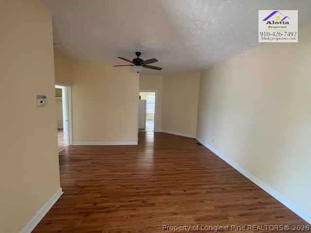3916 Middle Street Hope Mills, NC 28348 - Photo 9 of 12 a view of an empty room with wooden floor