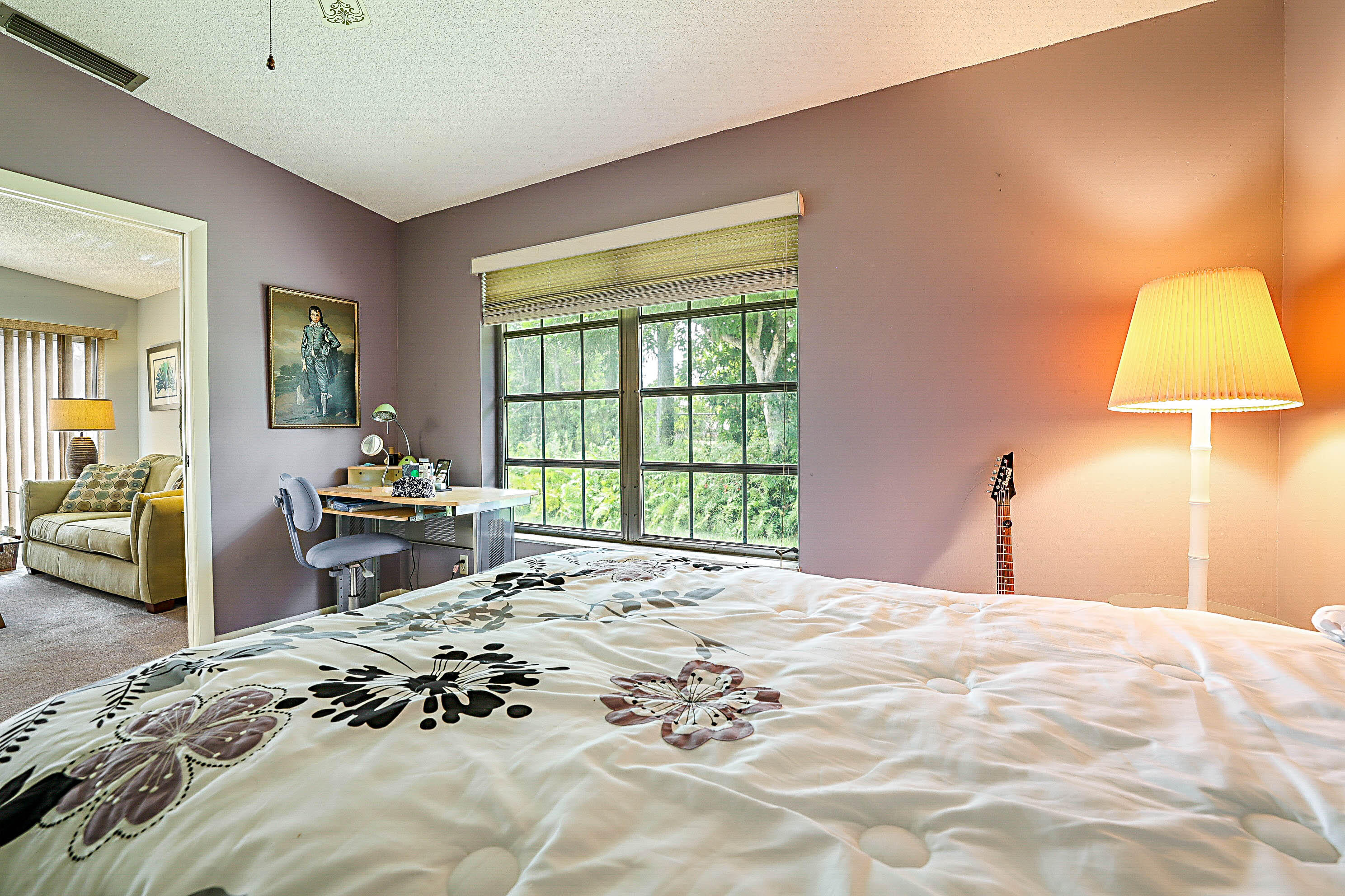 5231 Copperleaf Circle Delray Beach, FL 33484 - Photo 22 of 31 a bedroom with a bed and a window