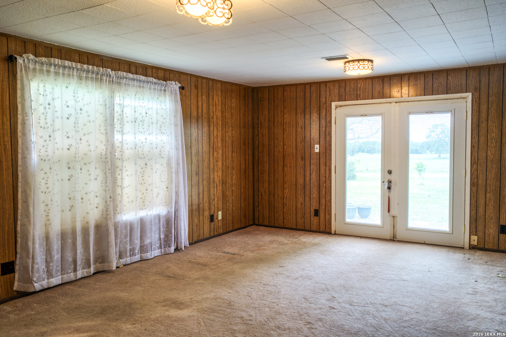 430 Watts Road Kingsbury, TX 78638 - Photo 32 of 37 an empty room with windows and closet