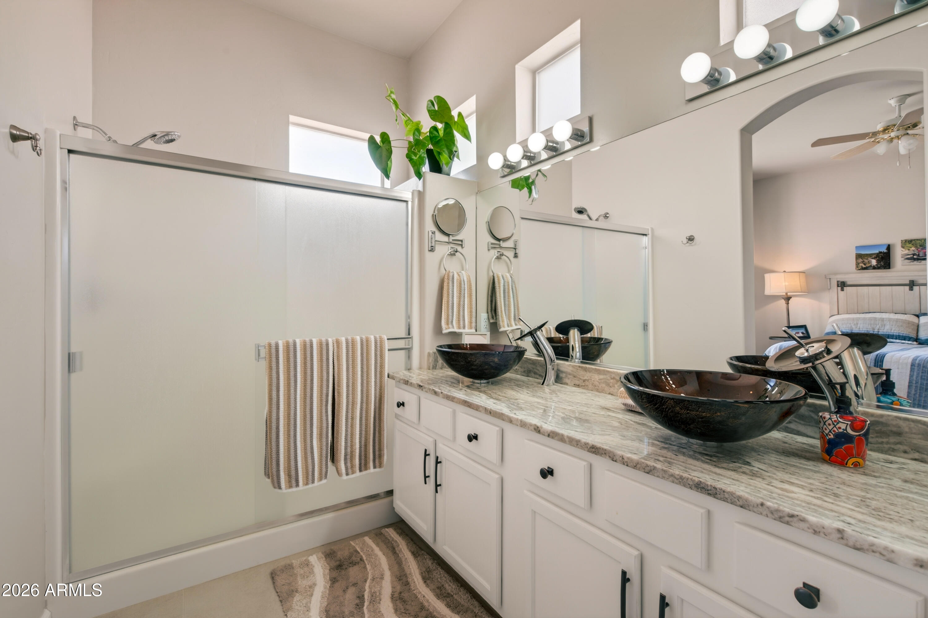 718 South Wandering River Road Cornville, AZ 86325 - Photo 23 of 41 a bath room with sink and mirror