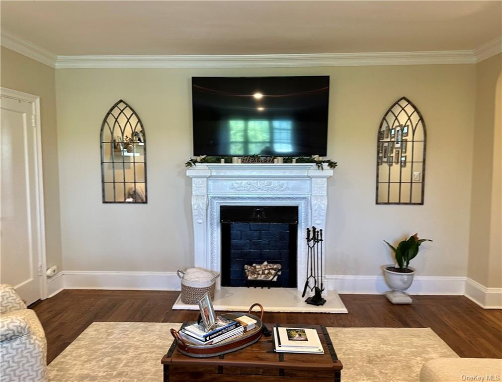 1273 North Avenue, Unit 4C5 New Rochelle, NY 10804 - Photo 1 of 15 a living room with furniture fireplace and window