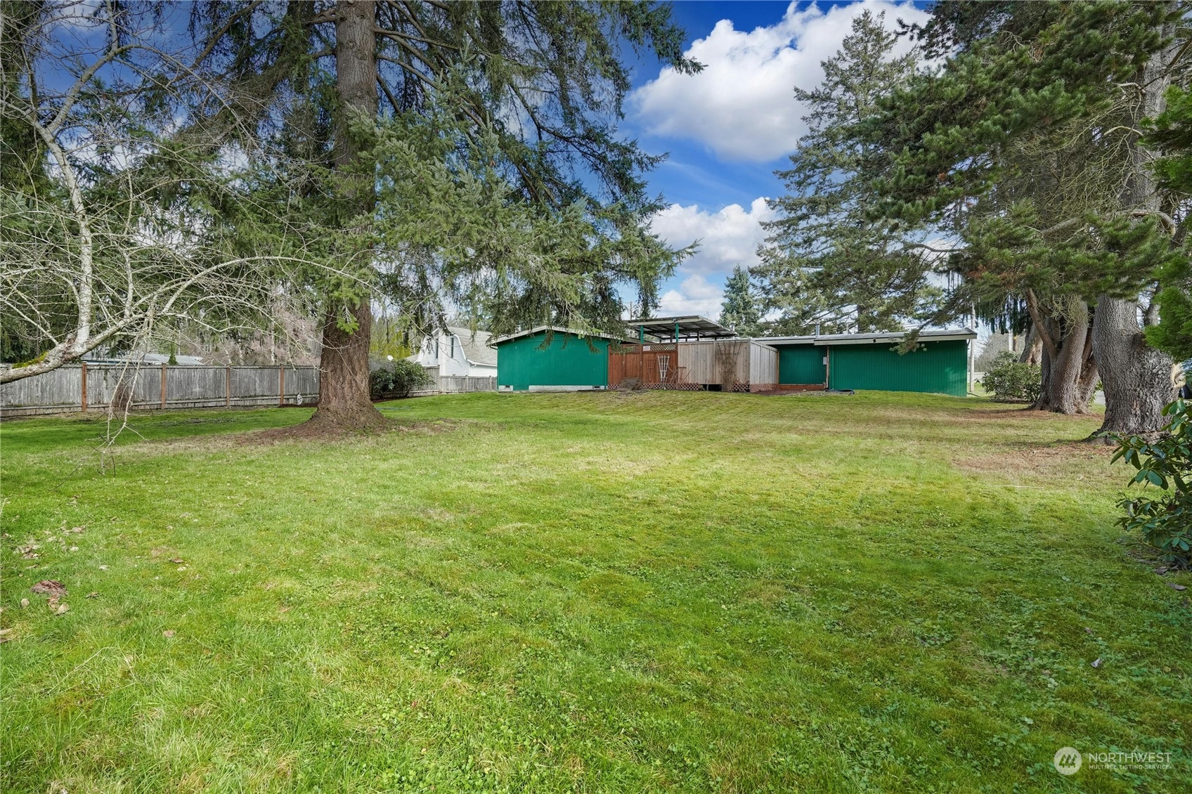 17316 North Road Bothell, WA 98012 - Photo 24 of 32 a view of a yard with a house