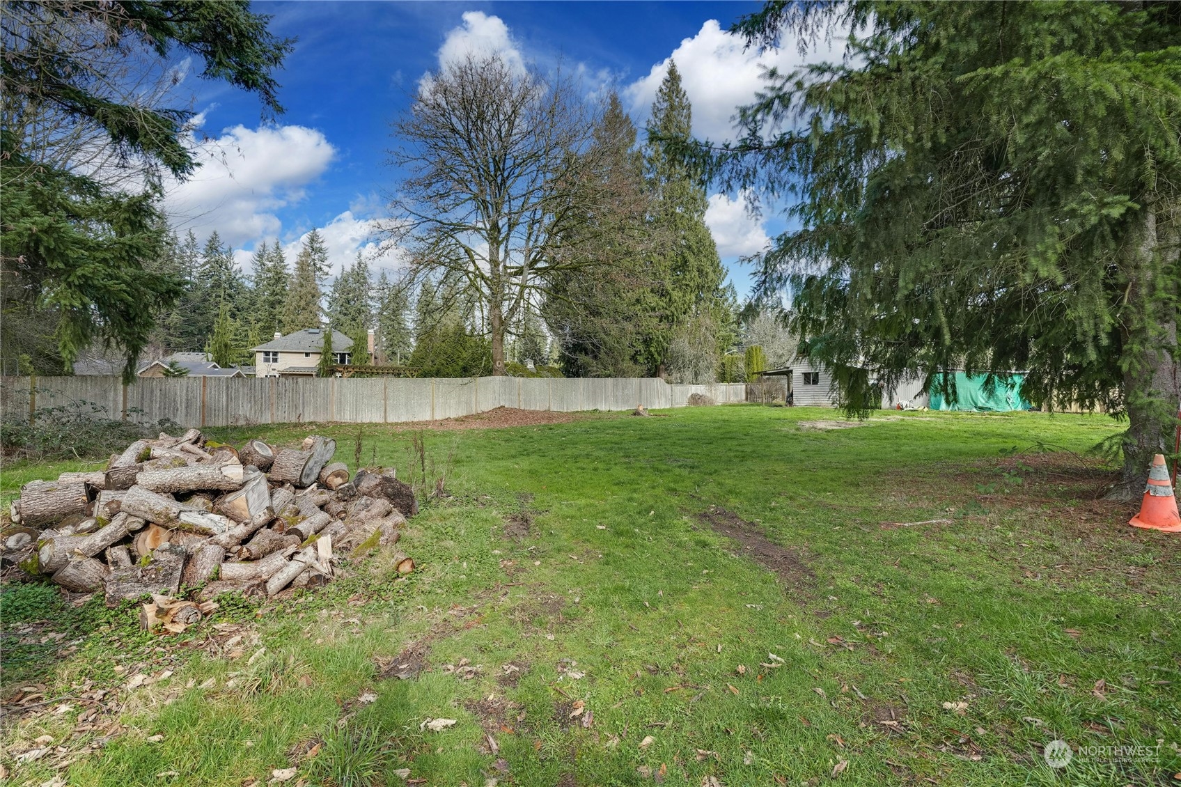 17316 North Road Bothell, WA 98012 - Photo 26 of 32 a backyard of a house with lots of green space
