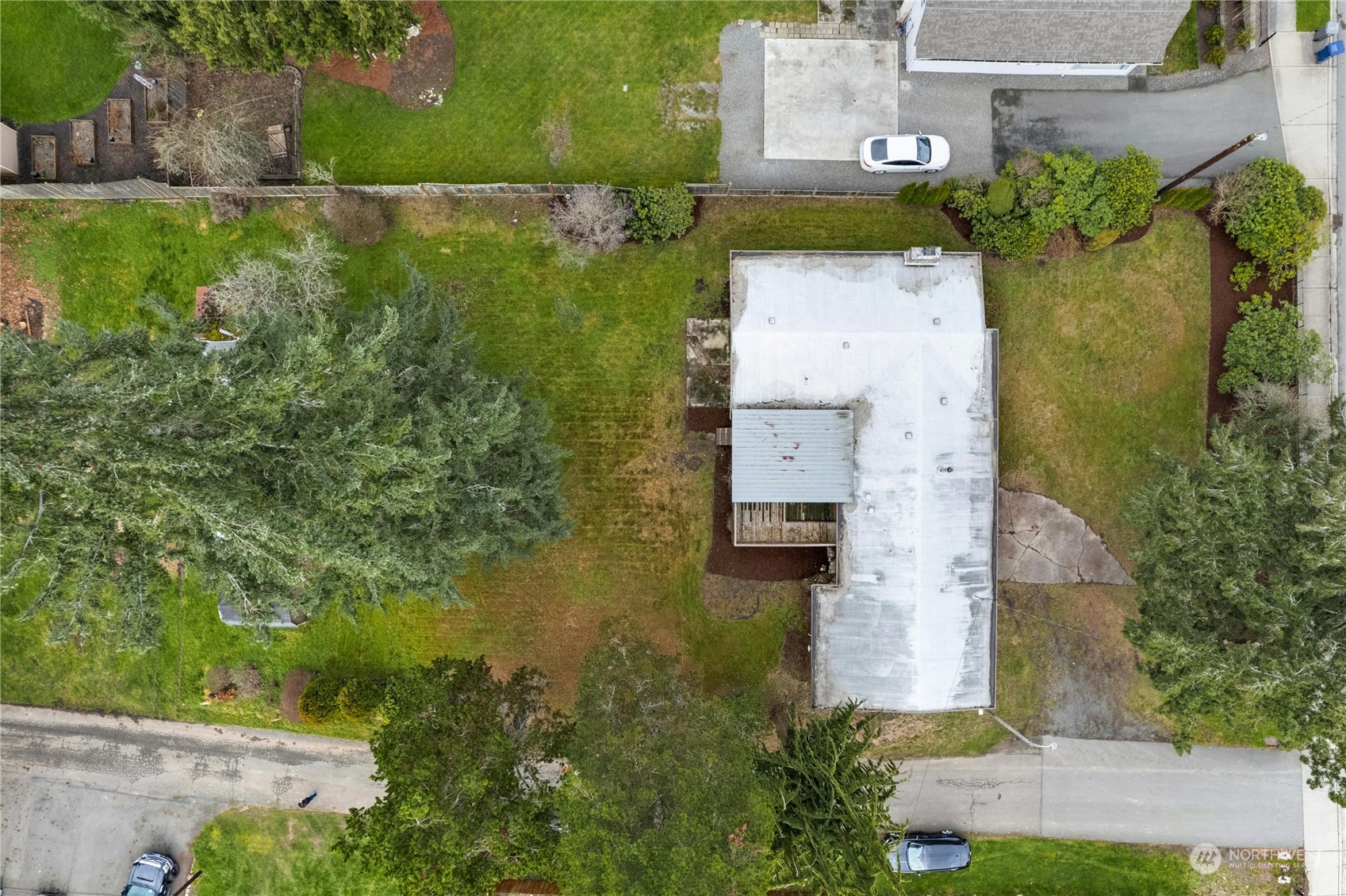 17316 North Road Bothell, WA 98012 - Photo 29 of 32 an aerial view of residential house with outdoor space and trees all around