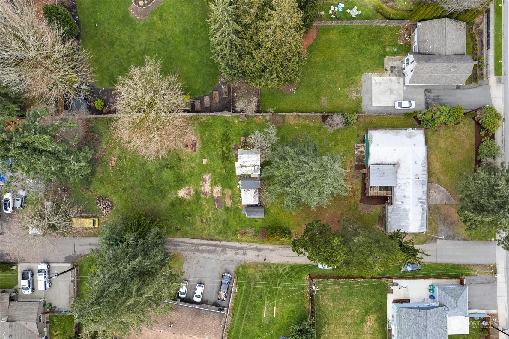 17316 North Road Bothell, WA 98012 - Photo 30 of 32 an aerial view of a house with outdoor space
