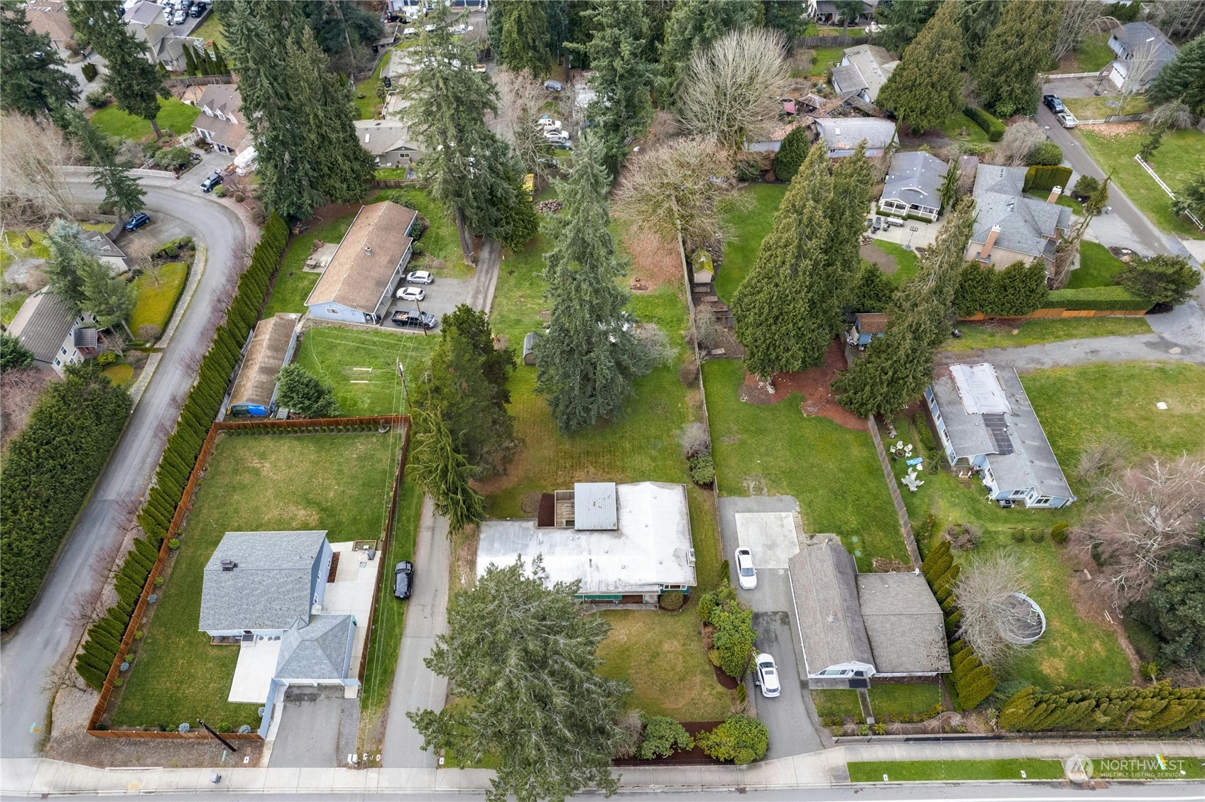 17316 North Road Bothell, WA 98012 - Photo 32 of 32 an aerial view of a house with outdoor space
