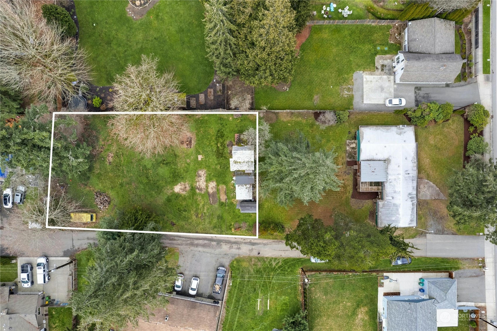 17316 North Road Bothell, WA 98012 - Photo 4 of 32 an aerial view of a residential houses with outdoor space