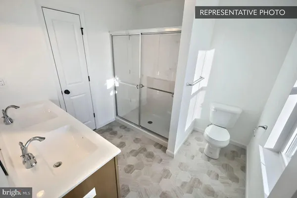 a bathroom with a sink and toilet