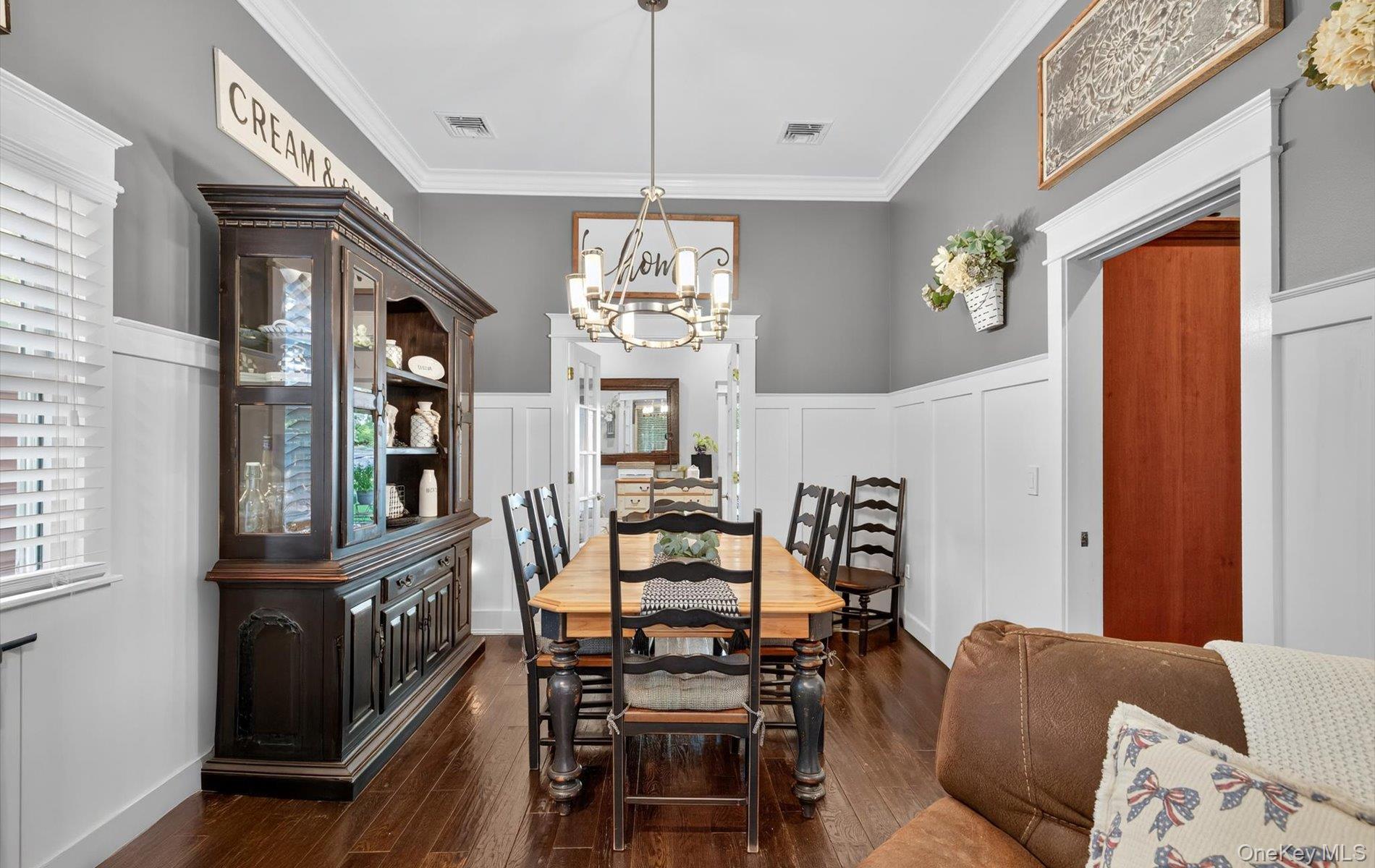 171 Dix Hills Road Dix Hills, NY 11746 - Photo 15 of 39 a view of a dining room with furniture window and wooden floor