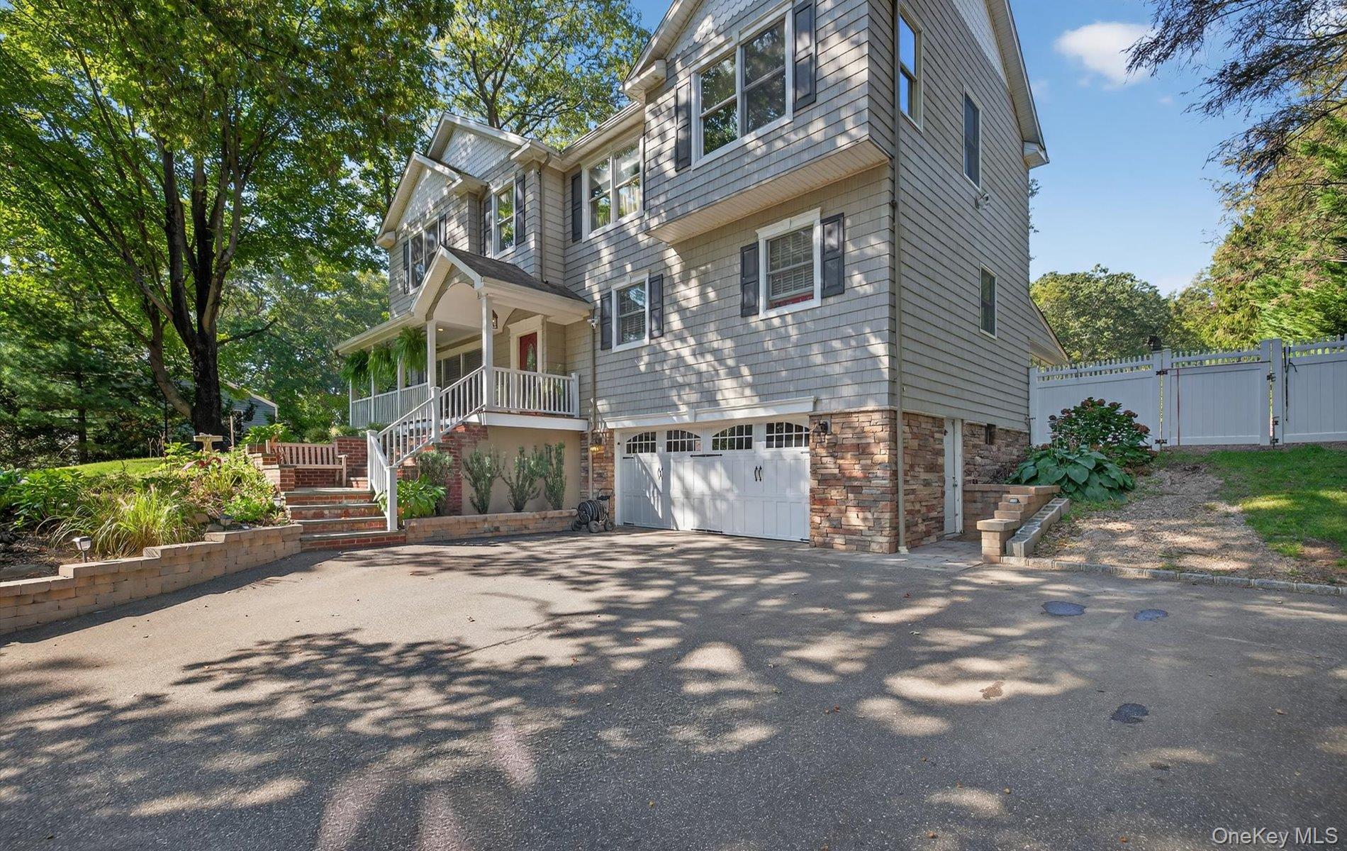 171 Dix Hills Road Dix Hills, NY 11746 - Photo 2 of 39 a view of a house with a street