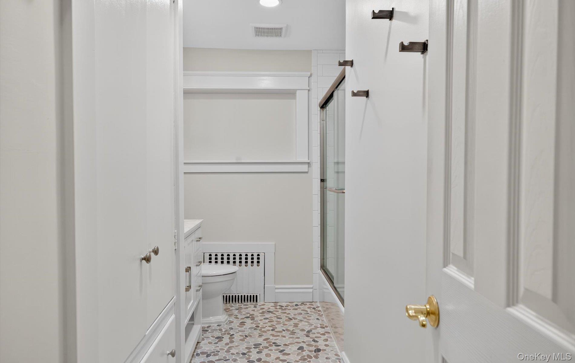 171 Dix Hills Road Dix Hills, NY 11746 - Photo 21 of 39 a bathroom with a window and a shower