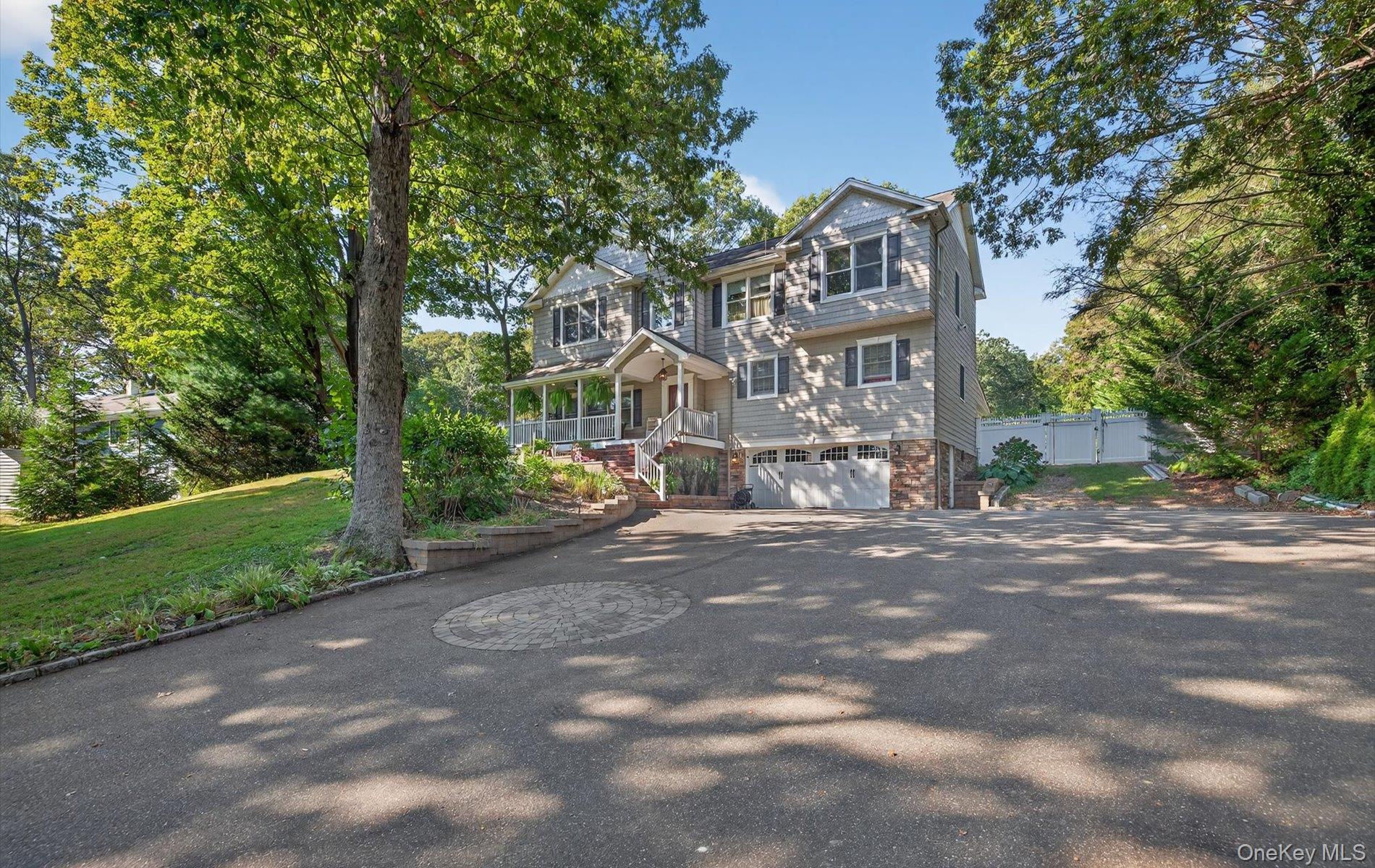 171 Dix Hills Road Dix Hills, NY 11746 - Photo 34 of 39 a view of a street with a building in the background