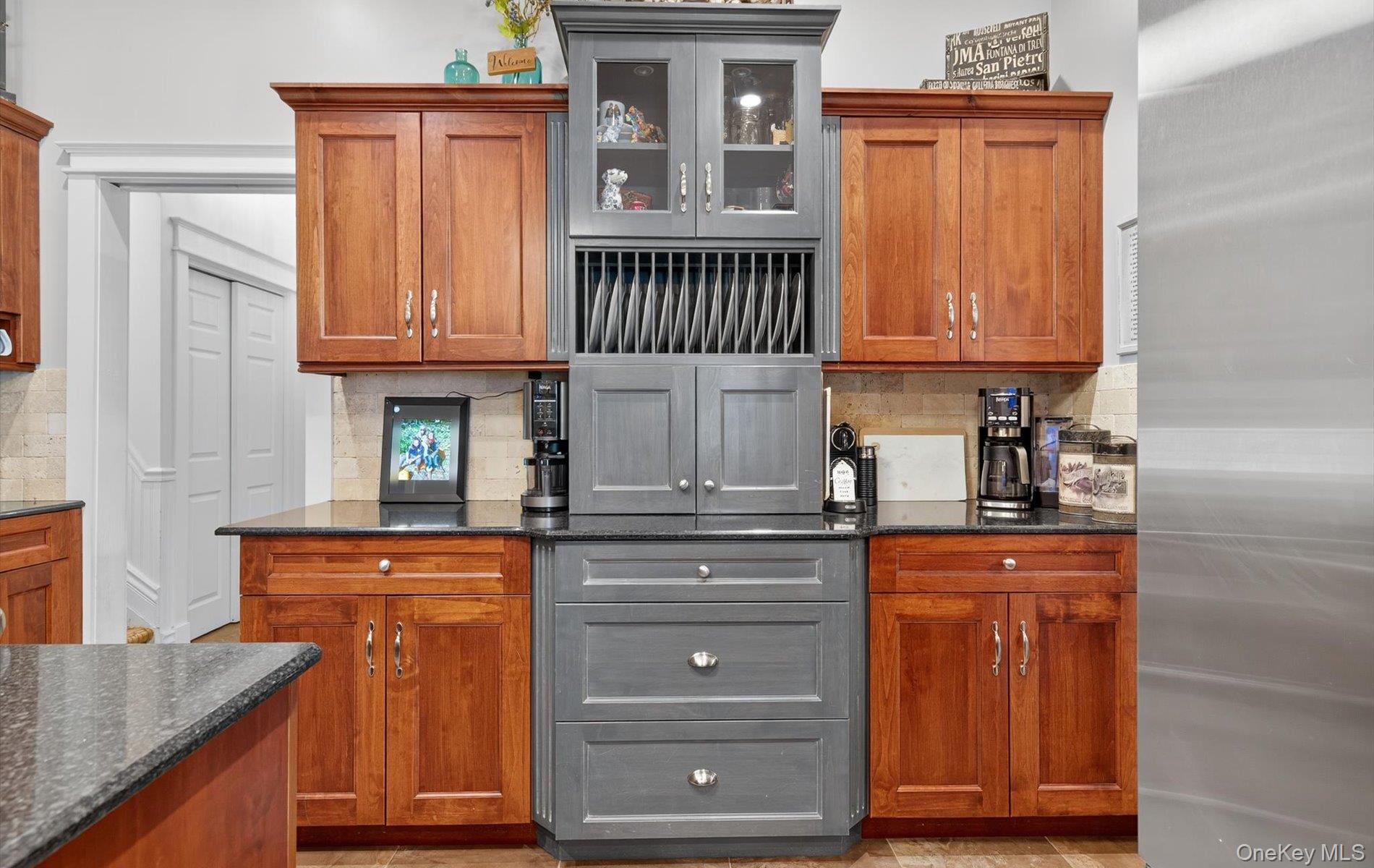 171 Dix Hills Road Dix Hills, NY 11746 - Photo 8 of 39 a kitchen with granite countertop wooden cabinets and a wooden floor