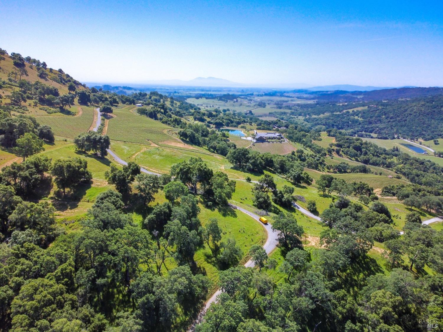 0 Quail Ridge Drive Napa, CA 94558 - Photo 3 of 30 an aerial view of a houses with a lake view and mountain view