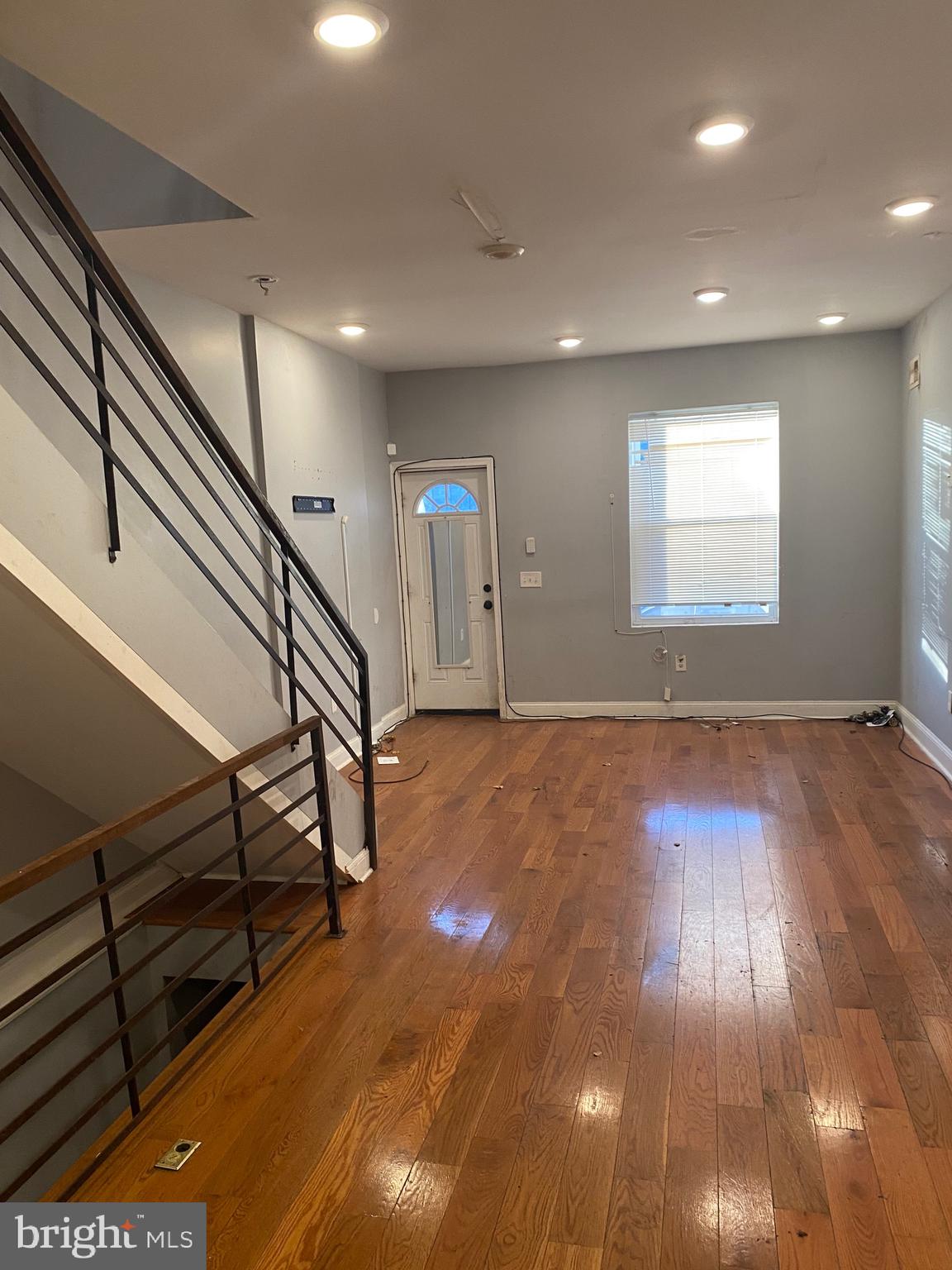 2331 North Cleveland Street Philadelphia, PA 19132 - Photo 2 of 7 Living Room w/ hardwood floors