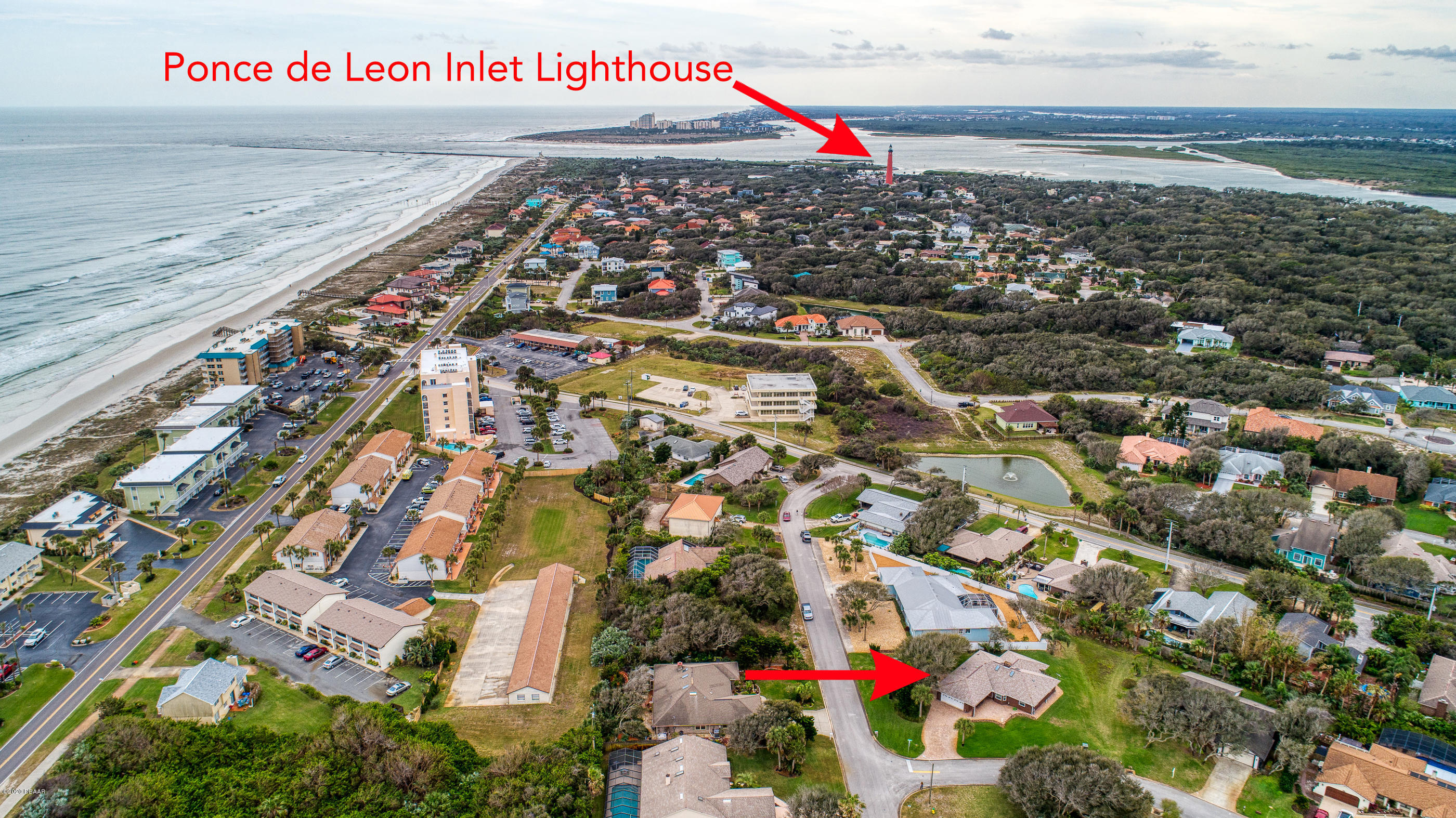 65 Buschman Drive Ponce Inlet, FL 32127 - Photo 3 of 51 65Buschman_Drone-5_arrow_lighthouse