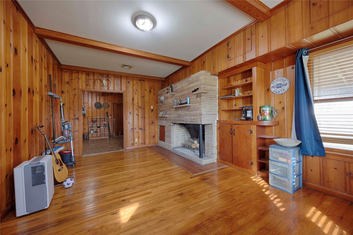 309 Anderson Street Schulenburg, TX 78956 - Photo 12 of 19 a view of livingroom with furniture and fireplace
