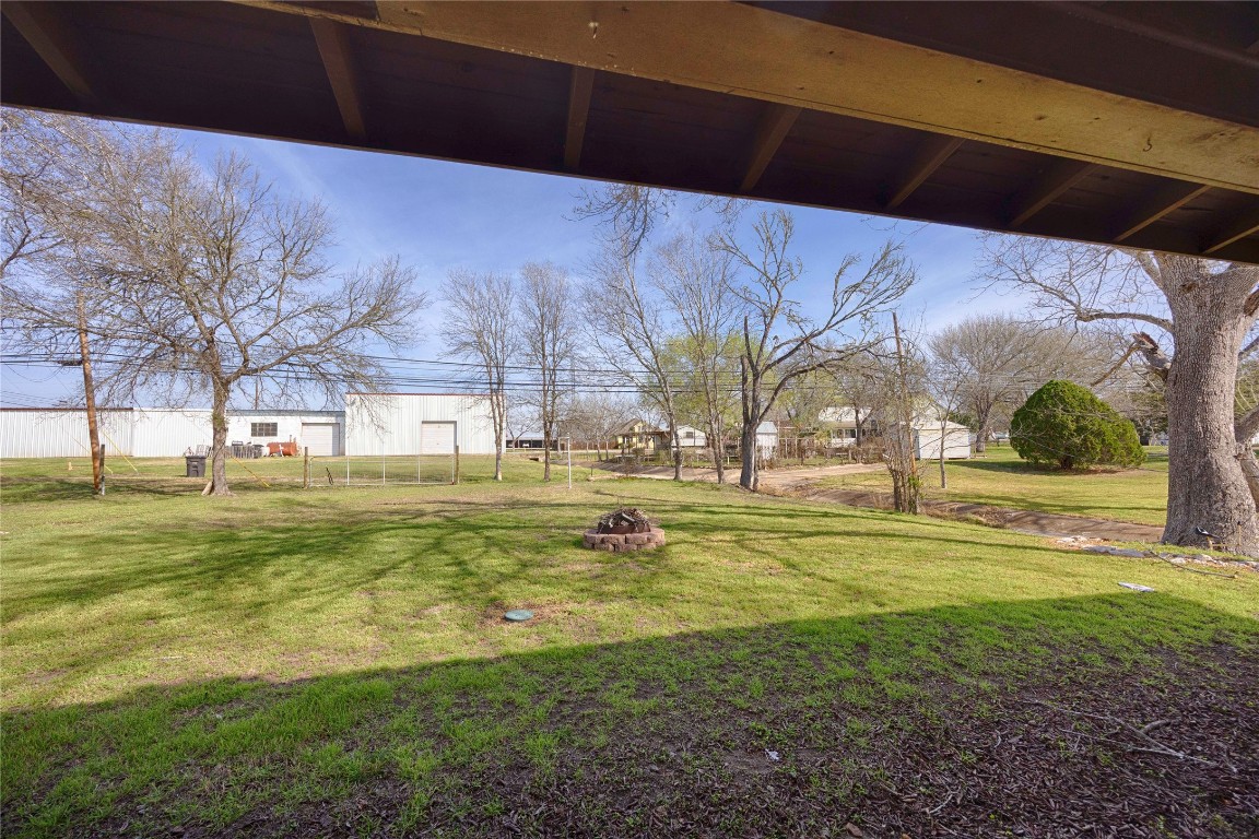 309 Anderson Street Schulenburg, TX 78956 - Photo 19 of 19 a swimming pool with outdoor seating and yard