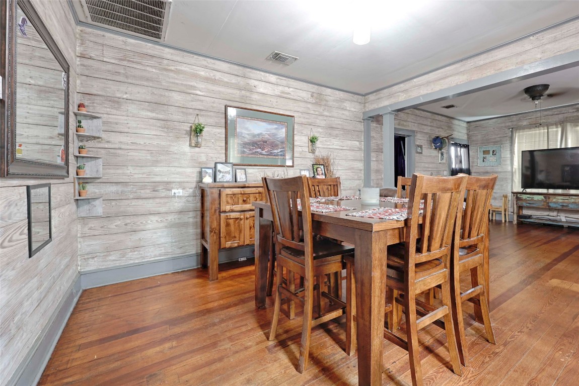 309 Anderson Street Schulenburg, TX 78956 - Photo 5 of 19 a dining room with furniture and wooden floor