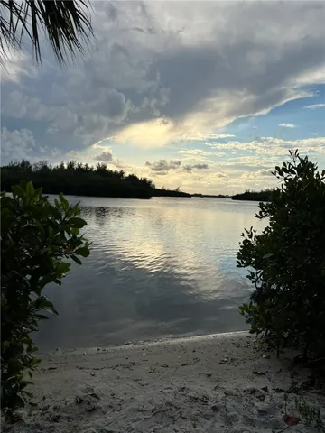 a view of a lake with a beach