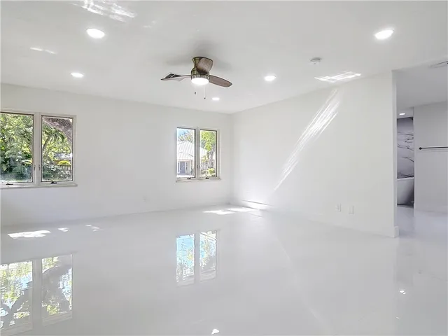 a view of empty room with windows