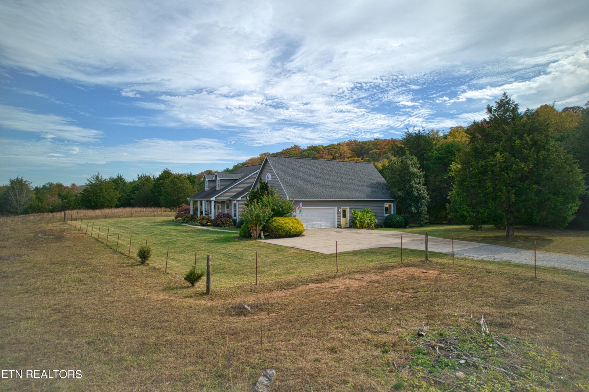 1443 West Dumplin Valley Road Dandridge, TN 37725 - Photo 11 of 51 a view of a house with a yard