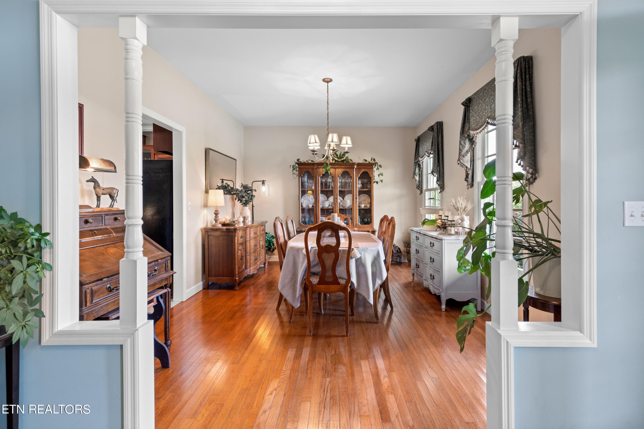 1443 West Dumplin Valley Road Dandridge, TN 37725 - Photo 13 of 51 a view of a living room with furniture and wooden floor