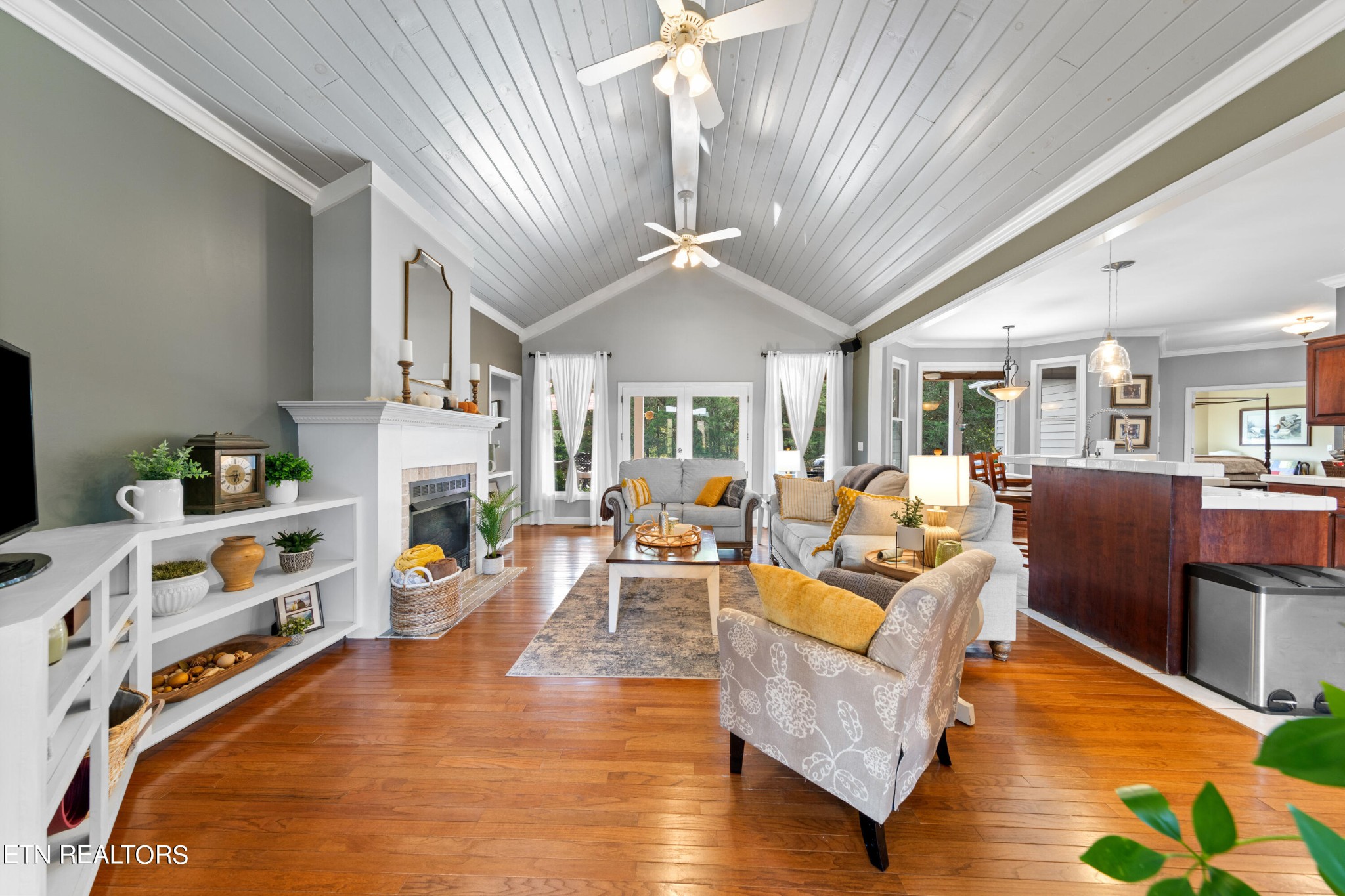 1443 West Dumplin Valley Road Dandridge, TN 37725 - Photo 16 of 51 a living room with furniture fireplace and a chandelier
