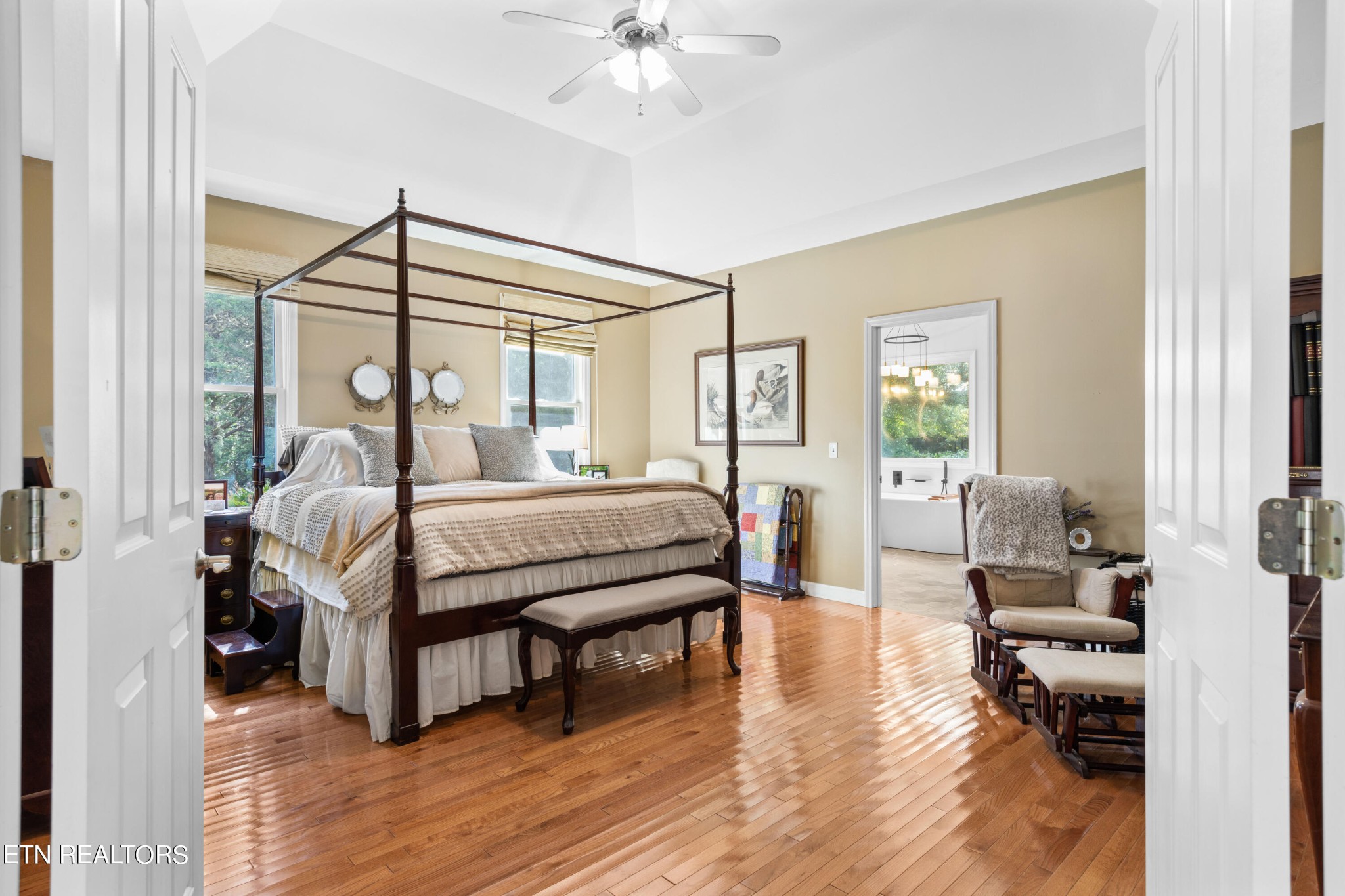 1443 West Dumplin Valley Road Dandridge, TN 37725 - Photo 25 of 51 a bedroom with a bed and wooden floor