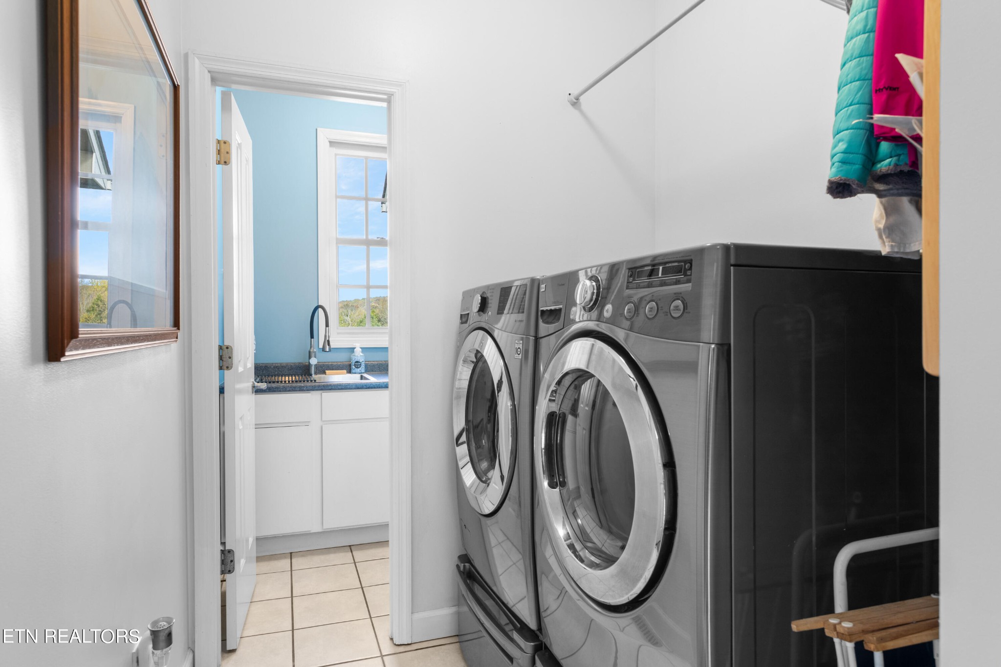 1443 West Dumplin Valley Road Dandridge, TN 37725 - Photo 30 of 51 a utility room with dryer and washer