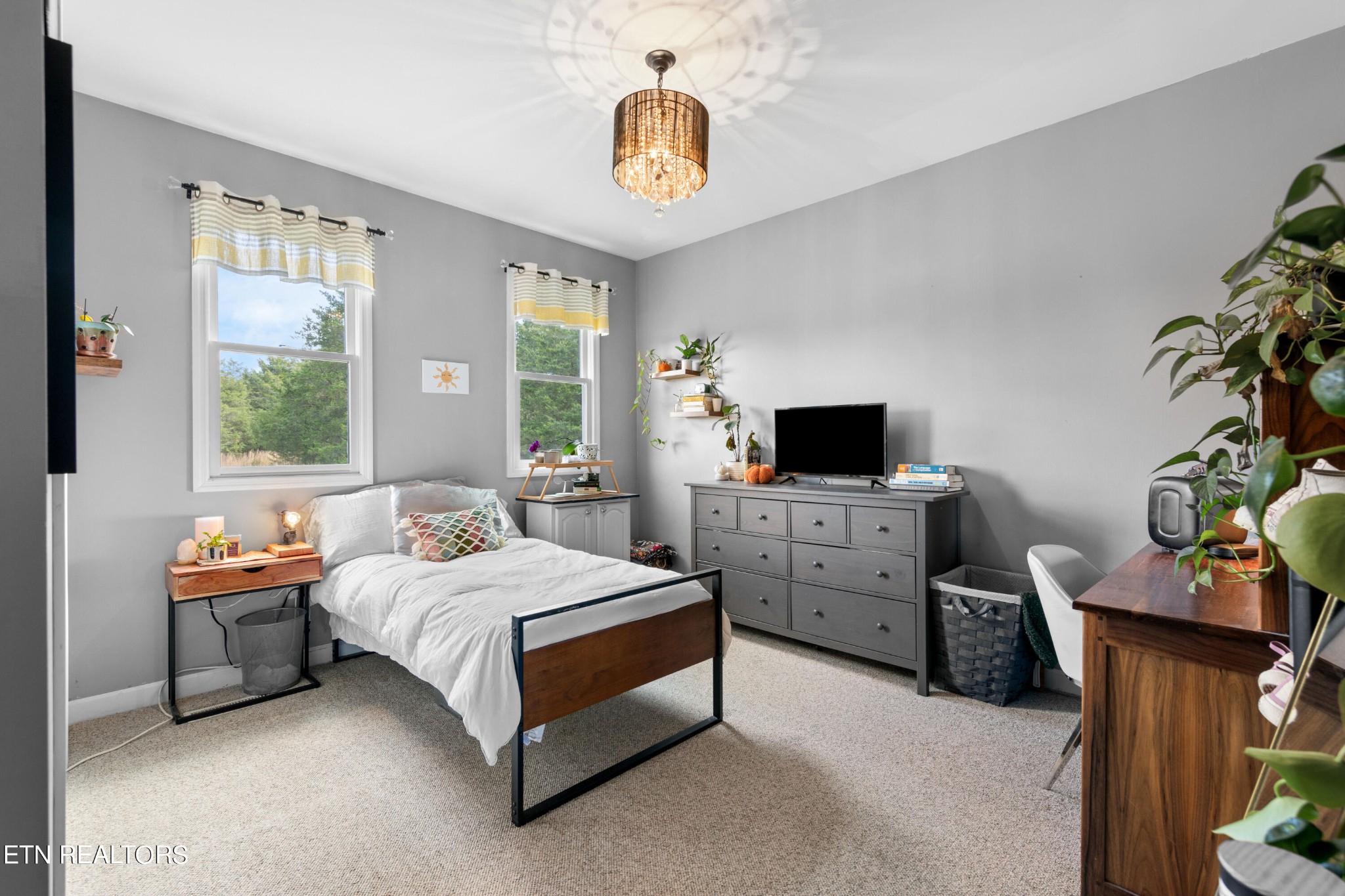 1443 West Dumplin Valley Road Dandridge, TN 37725 - Photo 36 of 51 a bedroom with a bed and a window