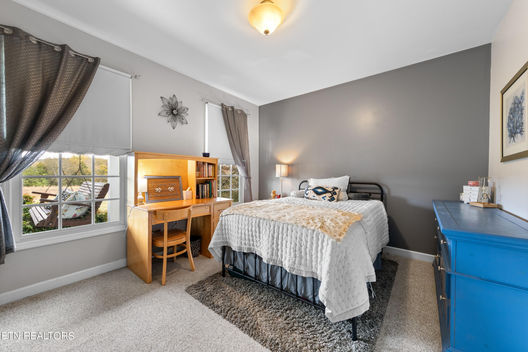 1443 West Dumplin Valley Road Dandridge, TN 37725 - Photo 38 of 51 a bedroom with a bed and a window